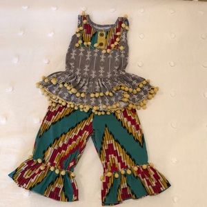 Mustard pie outfit with Pom Pom detail